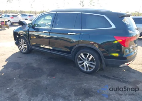 2017 Honda Pilot Touring z USA, uszkodzony, nr VIN 5FNYF5H90HB034244